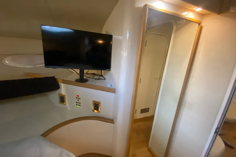 Slide: The Image of Interior of 1997 Sea Ray 40 Sundancer with TV and mirror. - 20