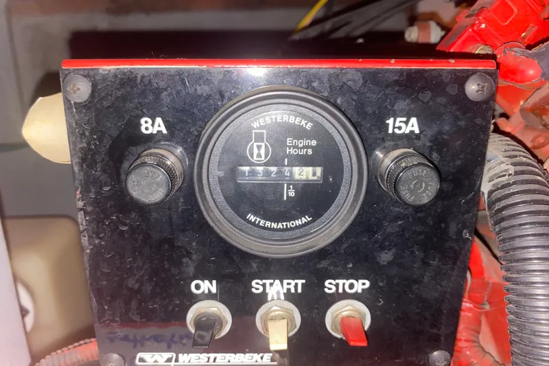 Slide: The Image of Control panel of a 1997 Sea Ray Sundancer 400 with Westerbeke engine hour meter. - 75