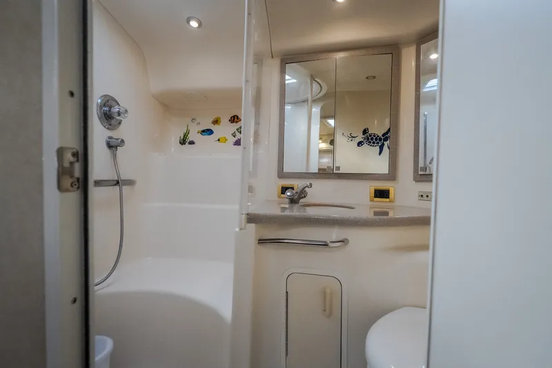 Slide: The Image of Bathroom interior of 1997 Sea Ray Sundancer 400 yacht with shower and vanity. - 58