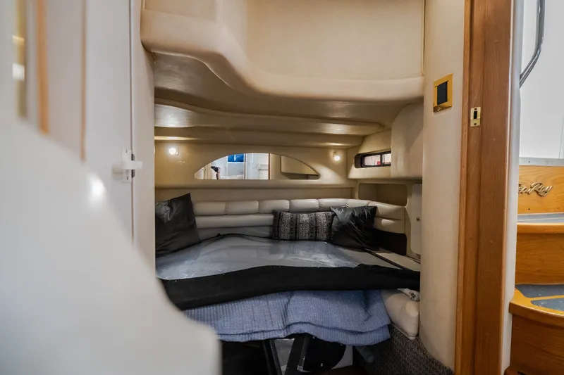 Slide: The Image of Interior cabin of 1997 Sea Ray Sundancer 400 yacht with cozy seating and cushions. - 47