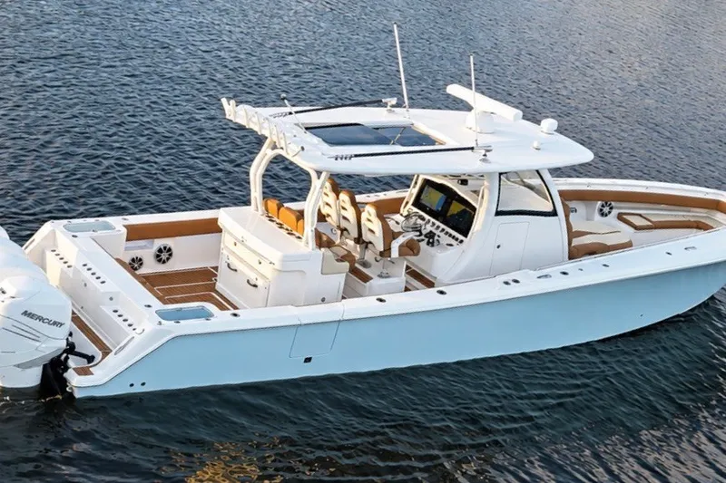Slide: The Image of 2008 Grady-White Express 330 boat on water, featuring sleek design and modern amenities. - 10