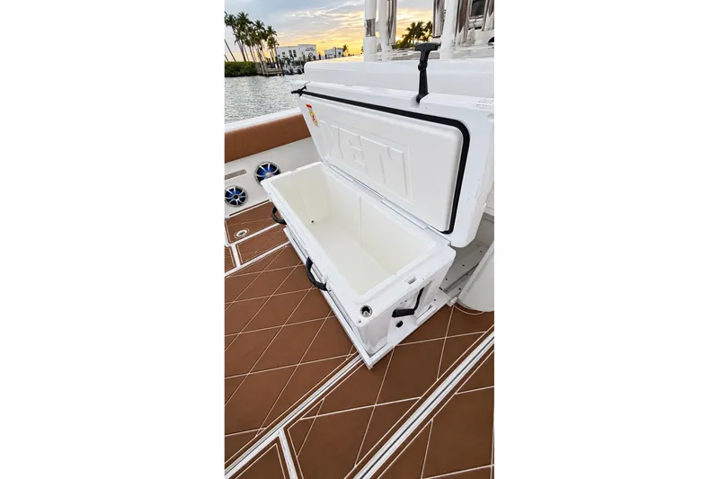 Slide: The Image of Open cooler on 2008 Grady-White Express 330 boat deck, with scenic waterfront view. - 53