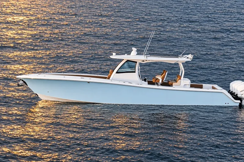 The Image of 2008 Grady-White Express 330 boat on water at sunset. - 0