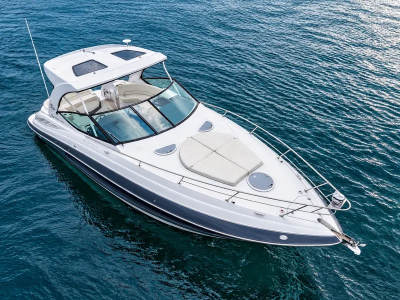 Slide: The Image of A sleek 2020 Cruisers Yachts 35 Express boat on calm water. - 12