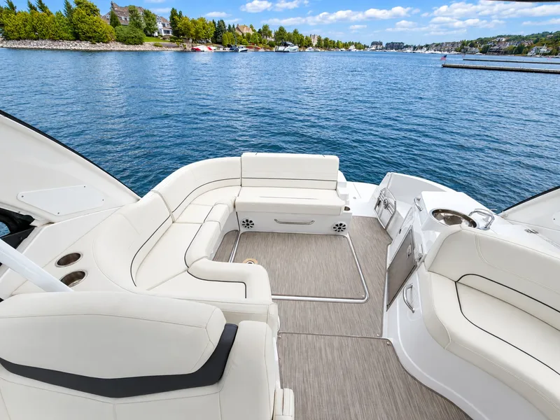 Slide: The Image of The image shows the cockpit of a 2020 Cruisers Yachts 35 Express with white seating and a view of the water. - 26