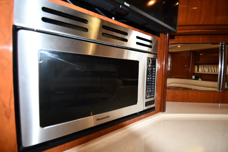 Slide: The Image of Microwave in 2004 Sea Ray 420 Sundancer yacht kitchen interior. - 40