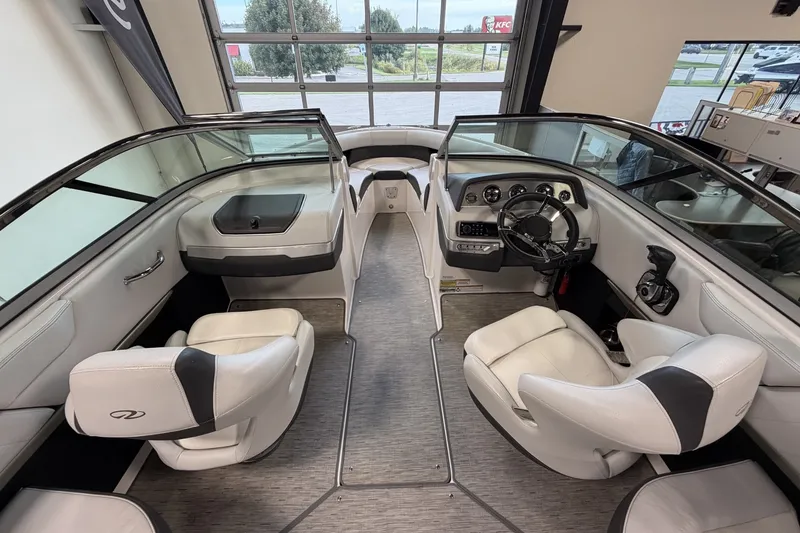 Slide: The Image of 2015 Regal 2300 Bowrider interior with sleek seating and modern dashboard design. - 21