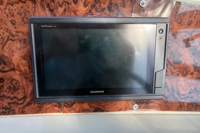 Slide: The Image of Garmin GPSMAP XS on 1997 Maxum 4100 SCR boat dashboard. - 27