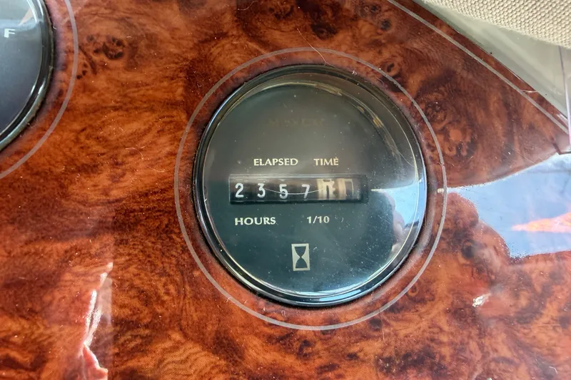 Slide: The Image of Elapsed time gauge on 1997 Maxum 4100 SCR boat, showing 2357 hours. - 30