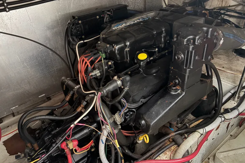 Slide: The Image of Engine compartment of a 1997 Maxum 4100 SCR boat, showcasing detailed wiring and components. - 35