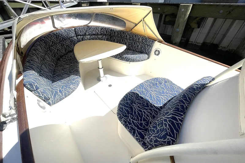 Slide: The Image of HINCKLEY TALARIA 29C BOW AND CENTER CONSOLE SEATING WITH HI/LO TABLE & WEATHER COVER. INCLUDES FORWARD DODGER FOR PROTECTION - 7