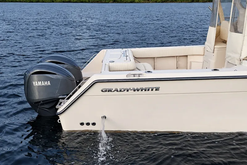 Slide: The Image of 2008 Grady-White Express 330 boat with Yamaha engines on water. - 1