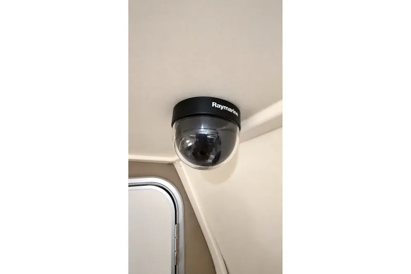 Slide: The Image of Raymarine dome camera installed on 2008 Grady-White Express 330 boat ceiling. - 33