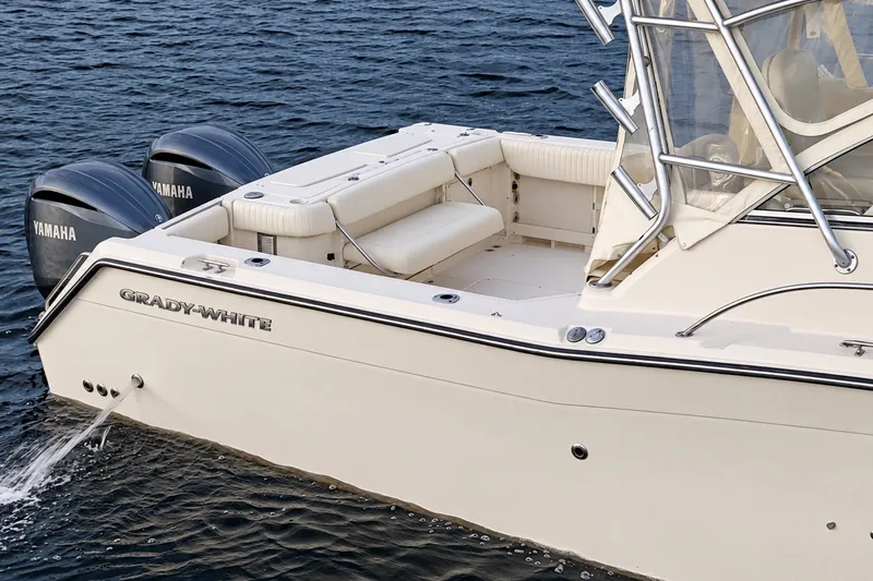 Slide: The Image of 2008 Grady-White Express 330 boat with Yamaha engines on water. - 2