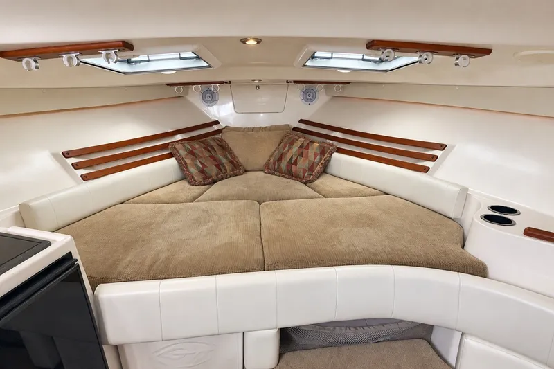 Slide: The Image of 2008 Grady-White Express 330 cabin interior with cozy bed and skylights. - 38