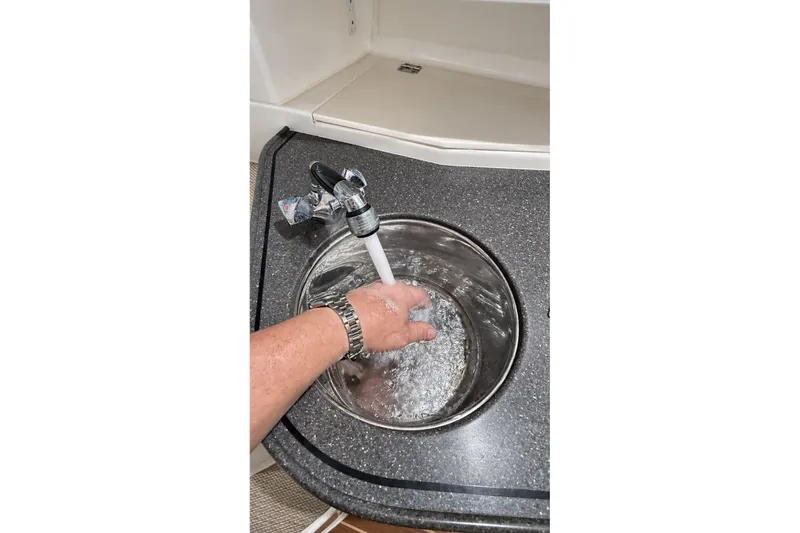 Slide: The Image of Hand washing in Grady-White Express 330 boat sink, 2008 model. - 34