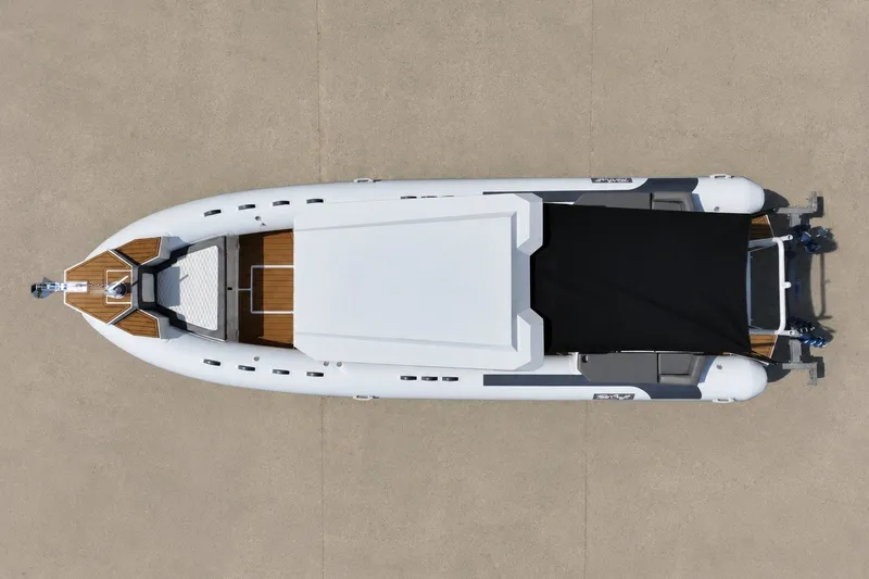 Slide: The Image of Aerial view of 2027 Tide Craft 26 Capri boat with sleek design and covered deck. - 13