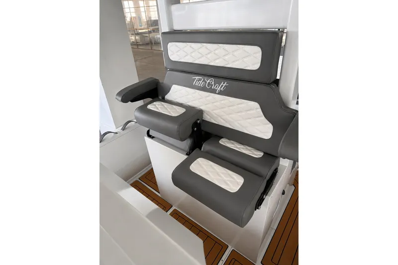 Slide: The Image of Luxurious seating on 2027 Tide Craft 26 Capri boat, featuring elegant quilted design. - 16