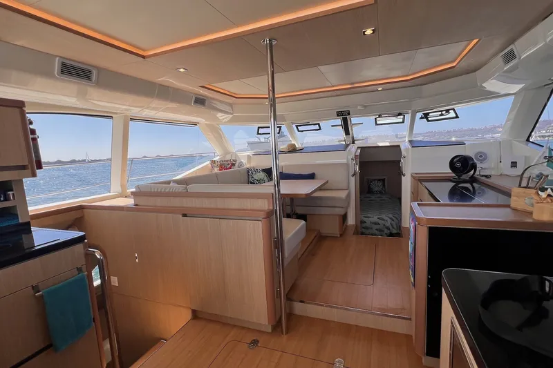Slide: The Image of Luxurious interior of 2018 Aquila 44 Yacht with panoramic windows and modern furnishings. - 48