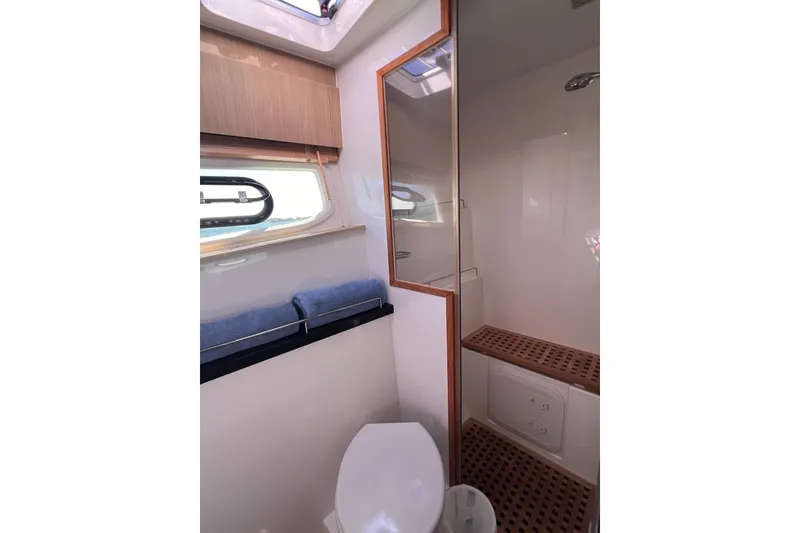 Slide: The Image of Bathroom interior of 2018 Aquila 44 Yacht with shower and toilet. - 54