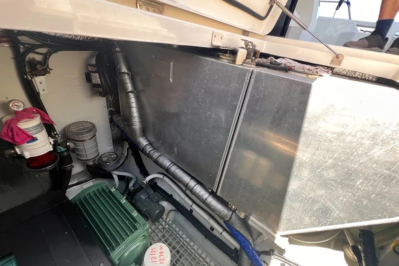 Slide: The Image of Engine compartment of 2018 Aquila 44 Yacht, showcasing mechanical components and storage. - 75