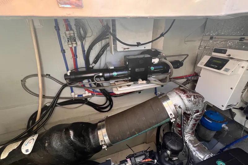 Slide: The Image of Engine room of 2018 Aquila 44 Yacht with mechanical and electrical components. - 76
