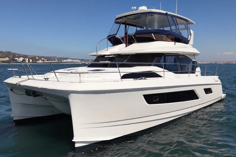 The Image of 2018 Aquila 44 Yacht cruising on open water under clear skies. - 0