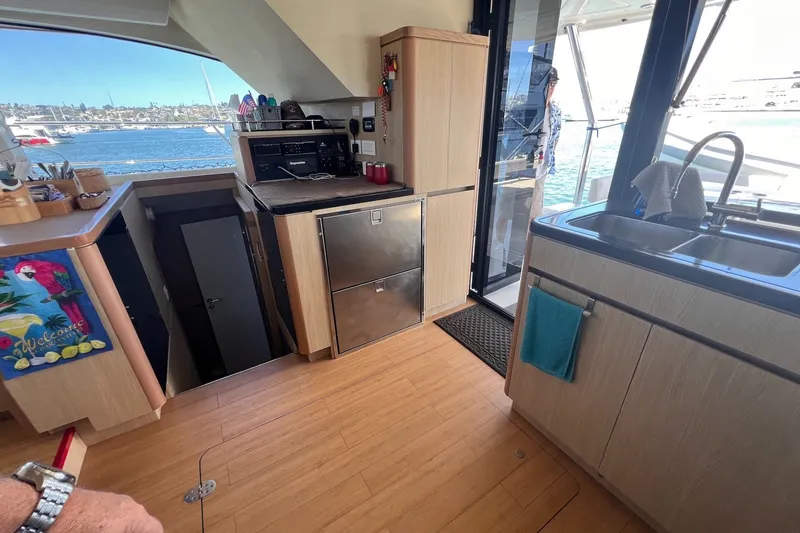 Slide: The Image of Interior of 2018 Aquila 44 Yacht with kitchen and ocean view. - 32