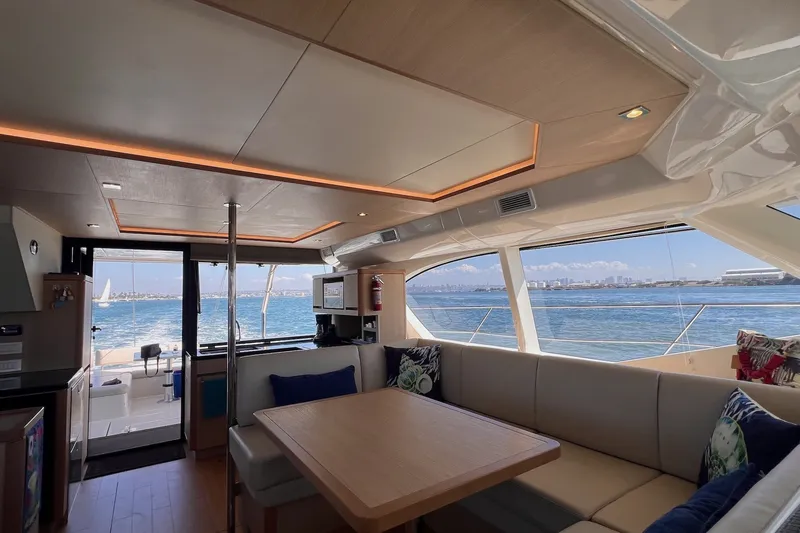 Slide: The Image of Luxurious interior of 2018 Aquila 44 Yacht with ocean view and elegant seating area. - 40