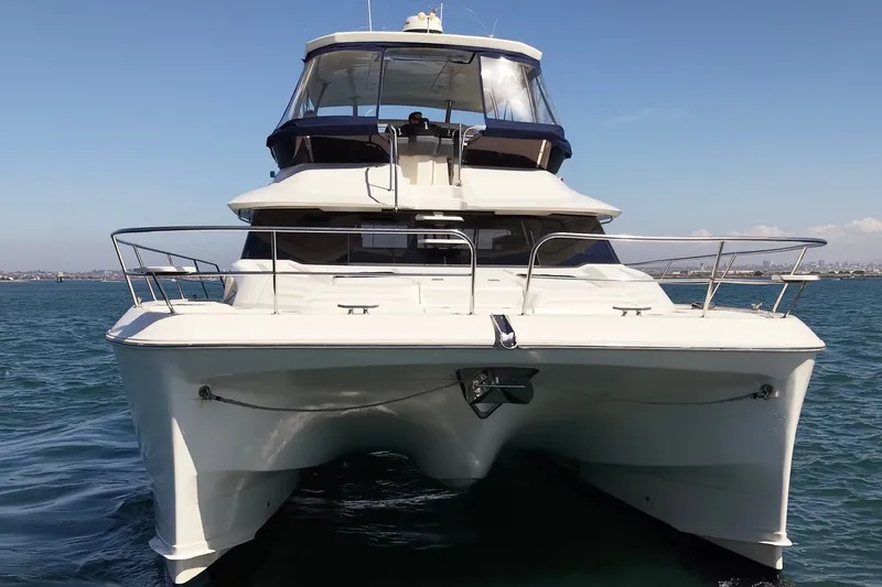Slide: The Image of 2018 Aquila 44 Yacht on open water, front view, clear sky background. - 61