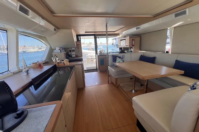 Slide: The Image of Interior of 2018 Aquila 44 Yacht with modern kitchen and dining area. - 41