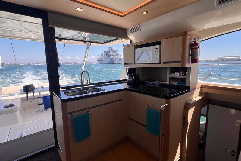 Slide: The Image of Interior view of 2018 Aquila 44 Yacht kitchen with ocean backdrop. - 43