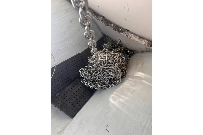 Slide: The Image of Coiled anchor chain on 2018 Aquila 44 Yacht deck. - 67