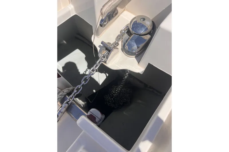 Slide: The Image of Anchor chain mechanism on 2018 Aquila 44 Yacht, featuring polished metal components. - 65