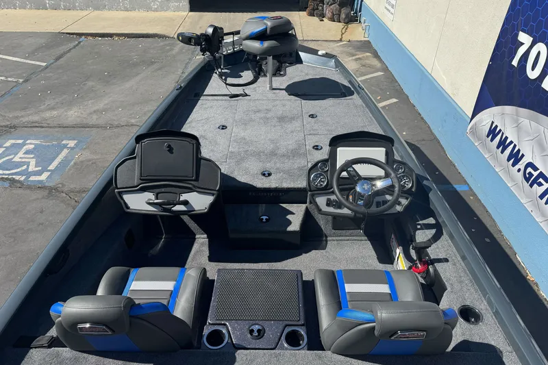 Slide: The Image of 2027 Ranger RT198P fishing boat interior with dual seats and steering console. - 8