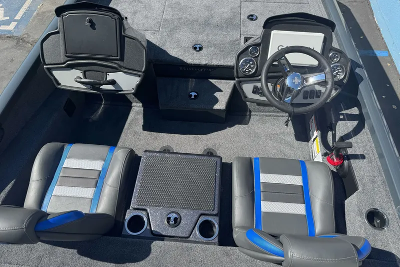 Slide: The Image of 2027 Ranger RT198P boat interior with dual seats, steering wheel, and dashboard controls. - 9