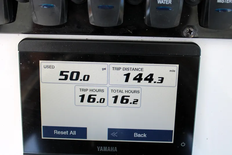 Slide: The Image of Display screen on 2022 Sea Hunt BX25FS showing fuel usage and trip data. - 24