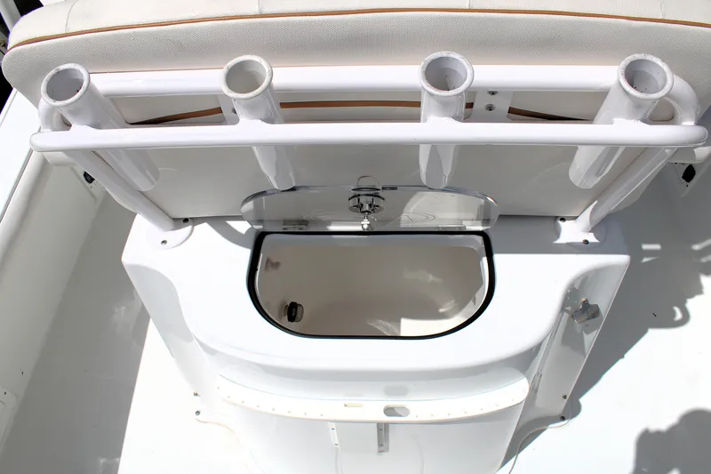 Slide: The Image of 2022 Sea Hunt BX25FS boat with rod holders and livewell. - 14