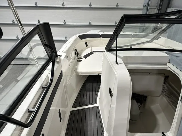 Slide: The Image of The image shows the cockpit of a 2025 Trophy T22SC boat with modern seating and fixtures. - 28