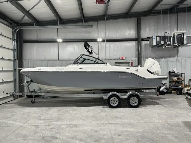 Slide: The Image of 2025 Trophy T22SC on a trailer in a warehouse. - 2