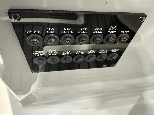 Slide: The Image of A control panel with various boat functions like stereo, lights, and pumps. - 19