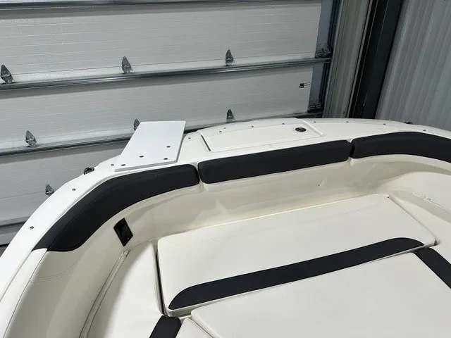 Slide: The Image of The image shows the bow area of a 2025 Trophy T22SC boat in a garage. - 33