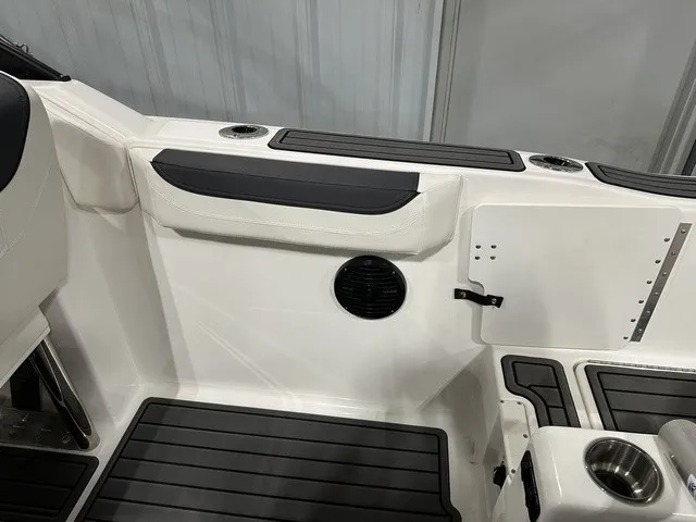Slide: The Image of The image shows the cockpit of a 2025 Trophy T22SC boat with black and white details. - 14
