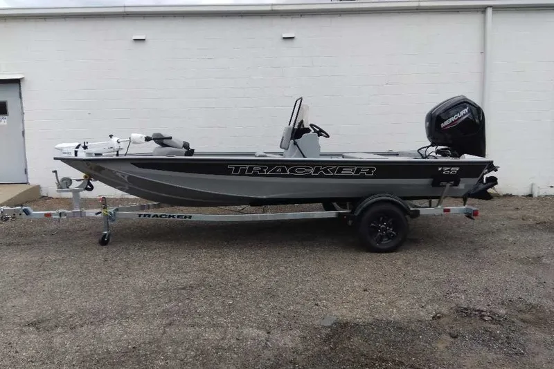 The Image of 2027 Tracker Bass Tracker 175 CC boat on trailer, parked outdoors. - 0