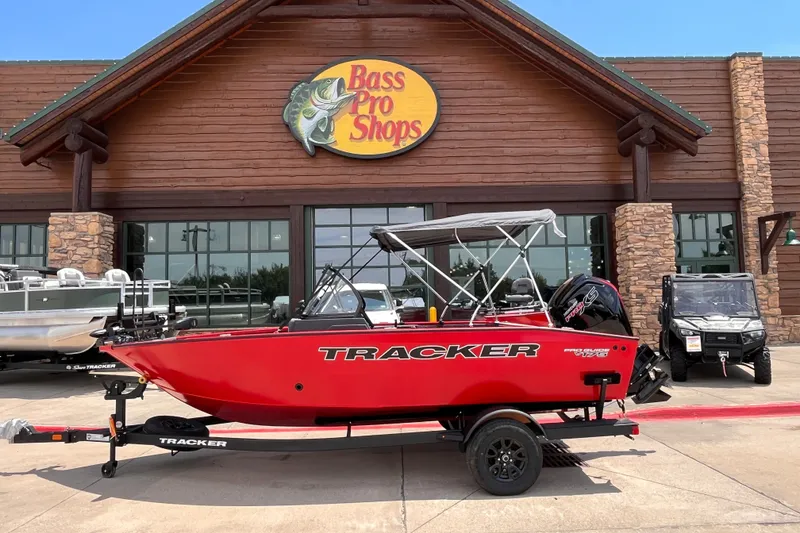 The Image of Red 2027 Tracker Pro Guide V-175 Combo boat displayed at Bass Pro Shops. - 0