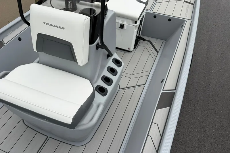 Slide: The Image of 2027 Tracker Bass Tracker Classic CC boat interior with sleek seating and modern design. - 17