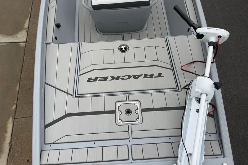 Slide: The Image of 2027 Tracker Bass Tracker Classic CC boat deck with trolling motor. - 15