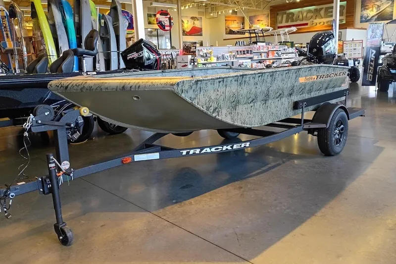 The Image of 2027 Tracker Grizzly 1553 Timber boat on trailer in showroom. - 0