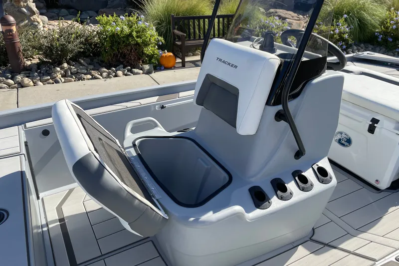 Slide: The Image of 2027 Tracker Bass Tracker Classic CC boat interior with open storage compartment. - 18
