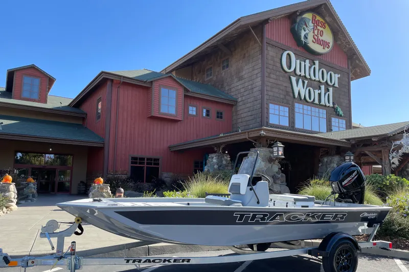 The Image of 2027 Tracker Bass Tracker Classic CC boat displayed outside Bass Pro Shops Outdoor World. - 0